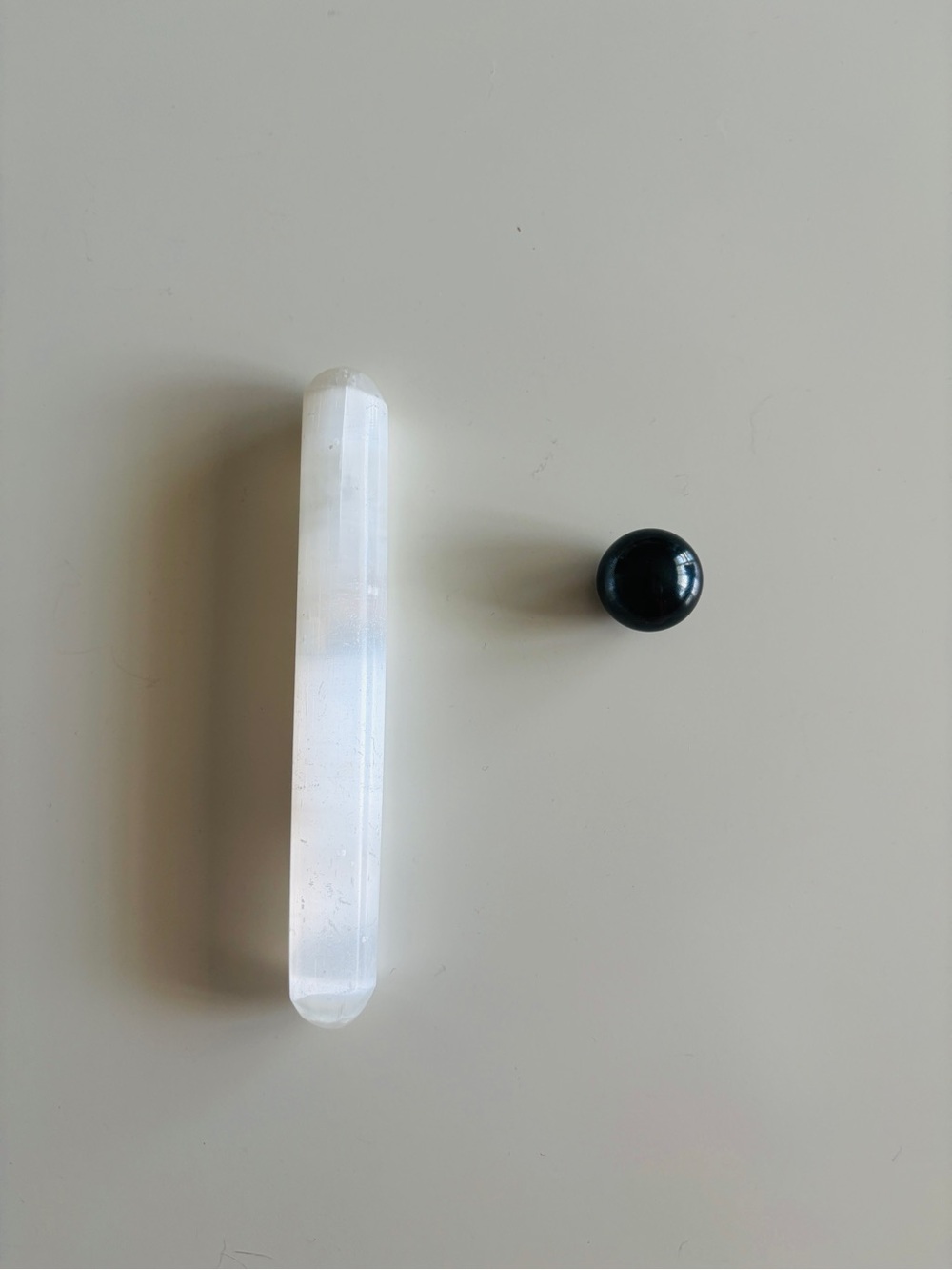 Selenite wand + hematite